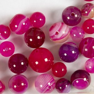 Achatperlen rosa 10x10-15x6 mm - 28 Stück. Achatperlen rosa 10x10-15x6 mm - 28 Stück.