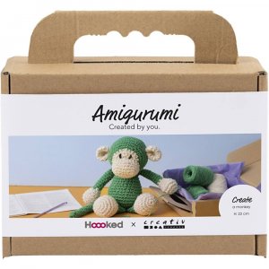 DIY-Set Amigurumi-Affe grün und cremeweiß - 1 Packung. DIY-Set Amigurumi-Affe grün und cremeweiß - 1 Packung.
