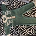 Kundenbild DROPS Merino Extra Fine Uni Color Garn - 50 g - Waldgrün (31)